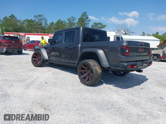 2020 Jeep Gladiator Rubicon with VIN 1C6JJTBG0LL187537, listed as a IAAI auction lot 42018914 with 53,443 mi miles and . Bid and sale history available at DreamBid. Image 3.