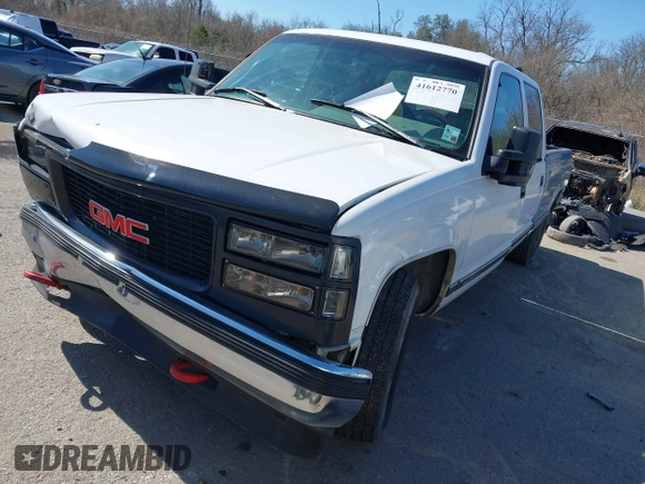 1996 GMC Sierra 1500 with VIN 1GTGC33R4TF018147, listed as a IAAI auction lot 41612770 with 106,443 mi miles and . Bid and sale history available at DreamBid. Image 17.