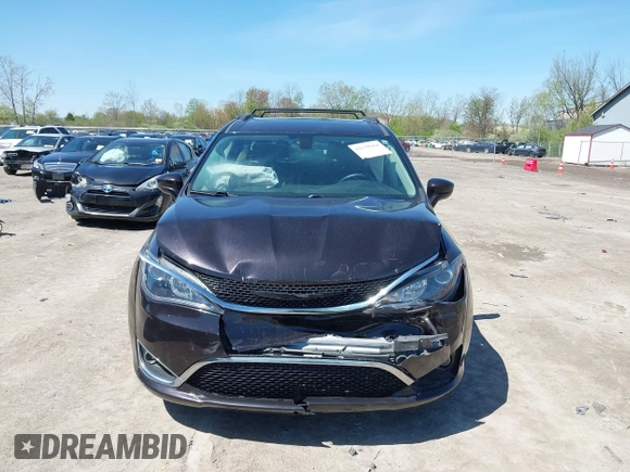2017 Chrysler Pacifica Touring L with VIN 2C4RC1BG0HR747551, listed as a IAAI auction lot 42139664 with 120,057 mi miles and . Bid and sale history available at DreamBid. Image 11.