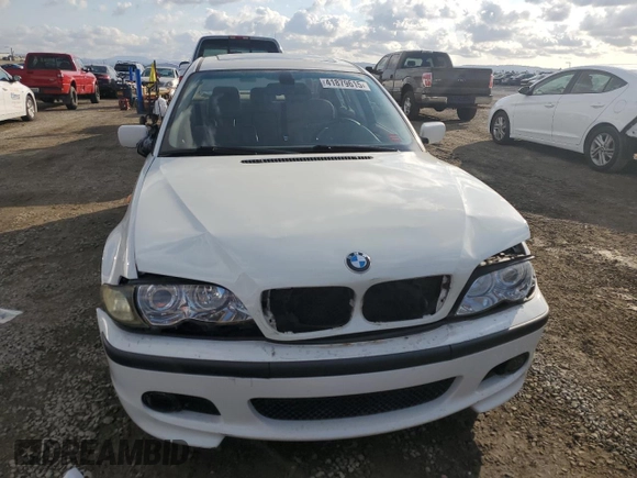 2004 BMW 3 Series 325i with VIN WBAAZ33454KP84385, listed as a Copart auction lot 41879615 with 140,811 mi miles and Salvage Title. Bid and sale history available at carsss.com. Image 5.