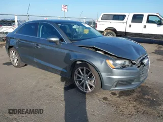 2015 Audi A3 Premium with VIN WAUACGFF3F1004852, listed as a IAAI auction lot 40869557 with 129,390 mi miles and . Bid and sale history available at DreamBid. Image 1.