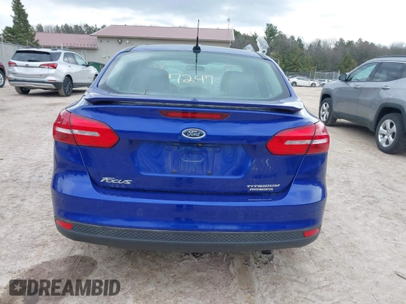 2015 Ford Focus Titanium with VIN 1FADP3J27FL298882, listed as a IAAI auction lot 42117247 with 124,185 mi miles and . Bid and sale history available at carsss.com. Image 16.