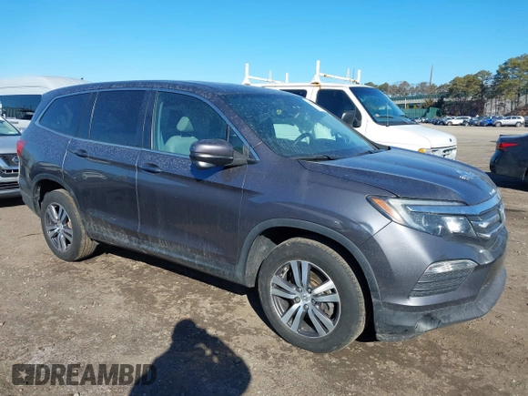 2017 Honda Pilot EX-L with VIN 5FNYF6H59HB101815, listed as a IAAI auction lot 41704661 with 130,479 mi miles and . Bid and sale history available at DreamBid. Image 1.