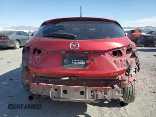 2018 Mazda 3 Touring z VIN 3MZBN1L3XJM170349, wystawiony jako Copart lot #55283645 z przebiegiem 167 930 mil mil oraz Szkoda całkowita • Salvage title. Historia ofert i sprzedaży dostępna na DreamBid. Obrazek 6.