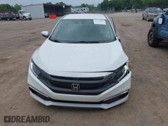 2020 Honda Civic LX z VIN 19XFC2F66LE021813, wystawiony jako IAAI lot #42285033 z przebiegiem 116 069 mil mil oraz . Historia ofert i sprzedaży dostępna na DreamBid. Obrazek 12.