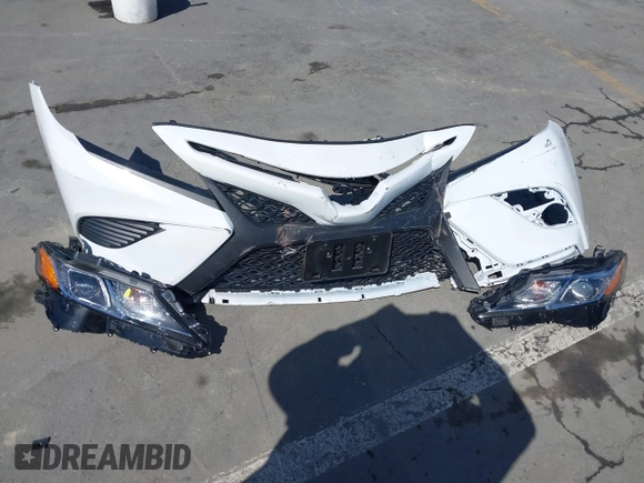 2020 Toyota Camry SE z VIN 4T1G11AK2LU970118, wystawiony jako IAAI lot #41950188 z przebiegiem 11 171 mil mil oraz . Historia ofert i sprzedaży dostępna na DreamBid. Obrazek 12.