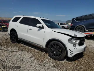 2015 Dodge Durango Special Service with VIN 1C4SDJFT1FC743049, listed as a Copart auction lot 60161544 with 137,763 mi miles and Salvage Title. Bid and sale history available at carsss.com. Image 4.
