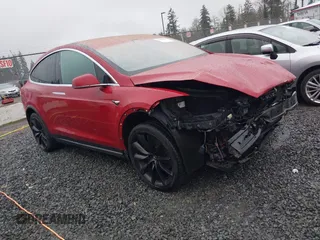 2019 Tesla Model X 75D with VIN 5YJXCBE23KF207739, listed as a IAAI auction lot 41808567 with 191,233 mi miles and . Bid and sale history available at DreamBid. Image 1.