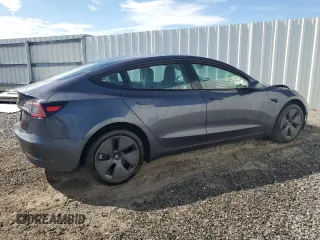 2023 Tesla Model 3 with VIN 5YJ3E1EA4PF613160, listed as a Copart auction lot 62008045 with 23,575 mi miles and Clean title. Bid and sale history available at DreamBid. Image 3.