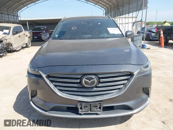 2016 Mazda CX-9 Grand Touring with VIN JM3TCADY5G0120033, listed as a IAAI auction lot 42248488 with 150,044 mi miles and . Bid and sale history available at DreamBid. Image 13.