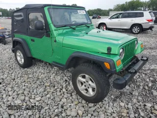 2004 Jeep Wrangler SE with VIN 1J4FA29124P769475, listed as a Copart auction lot 64371244 with 136,877 mi miles and Salvage title. Bid and sale history available at DreamBid. Image 4.