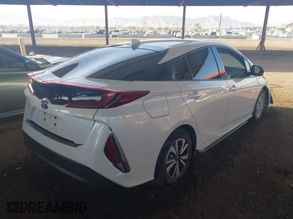 2017 Toyota Prius Plus with VIN JTDKARFP1H3033355, listed as a IAAI auction lot 41668476 with 87,330 mi miles and . Bid and sale history available at DreamBid. Image 4.
