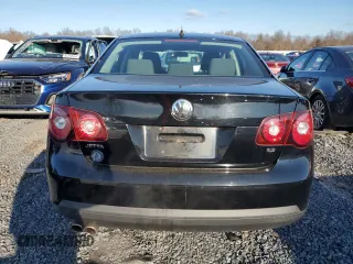 2009 Volkswagen Jetta z VIN 3VWHZ71K59M088780, wystawiony jako Copart lot #87115414 z przebiegiem 88 197 mil mil oraz Czysty tytuł • Clean title. Historia ofert i sprzedaży dostępna na DreamBid. Obrazek 6.