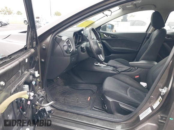 2015 Mazda 3 i Touring with VIN JM1BM1L7XF1261134, listed as a IAAI auction lot 42164554 with 130,570 mi miles and . Bid and sale history available at DreamBid. Image 5.
