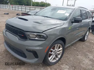 2023 Dodge Durango R/T Plus z VIN 1C4SDHCT9PC553174, wystawiony jako IAAI lot #42635197 z przebiegiem 51 121 mil mil oraz . Historia ofert i sprzedaży dostępna na DreamBid. Obrazek 2.