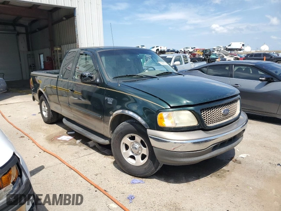 2002 Ford F-150 XL z VIN 1FTRX17W52NB81525, wystawiony jako Copart lot #57981075 z przebiegiem 236 673 mil mil oraz Szkoda całkowita • Salvage title. Historia ofert i sprzedaży dostępna na DreamBid. Obrazek 4.