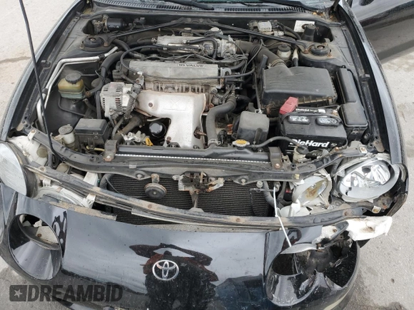 1996 Toyota Celica GT z VIN JT5FG02T3T0031613, wystawiony jako Copart lot #58410225 z przebiegiem 124 899 mil mil oraz Szkoda całkowita • Salvage title. Historia ofert i sprzedaży dostępna na DreamBid. Obrazek 11.