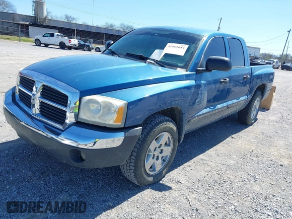 2005 Dodge Dakota SLT with VIN 1D7HW48N05S339156, listed as a IAAI auction lot 41862684 with 158,796 mi miles and . Bid and sale history available at DreamBid. Image 2.