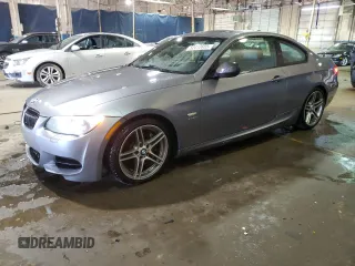 2011 BMW 3 Series 335is with VIN WBAKG1C56BE599457, listed as a Copart auction lot 52412655 with 134,497 mi miles and Clean title. Bid and sale history available at DreamBid. Image 1.