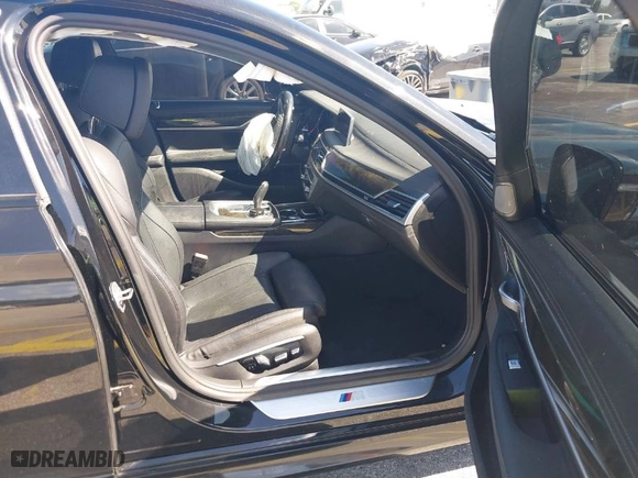 2016 BMW 7 Series 740i with VIN WBA7E2C51GG738889, listed as a IAAI auction lot 41838071 with 49,649 mi miles. Bid and sale history available at carsss.com. Image 5.