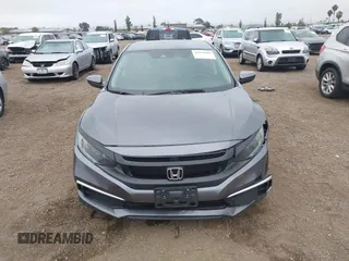 2020 Honda Civic LX with VIN 2HGFC2F63LH567698, listed as a IAAI auction lot 42354886 with 70,977 mi miles and . Bid and sale history available at DreamBid. Image 13.