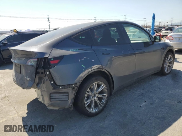 2024 Tesla Model Y Long Range z VIN 7SAYGDEE5RA244641, wystawiony jako Copart lot #51864845 z przebiegiem 23 096 mil mil oraz Szkoda całkowita • Salvage title. Historia ofert i sprzedaży dostępna na DreamBid. Obrazek 3.