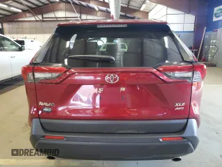 2019 Toyota RAV4 XLE with VIN JTMP1RFV8KD013013, listed as a Copart auction lot 50964245 with 70,656 mi miles and Salvage Title. Bid and sale history available at carsss.com. Image 6.