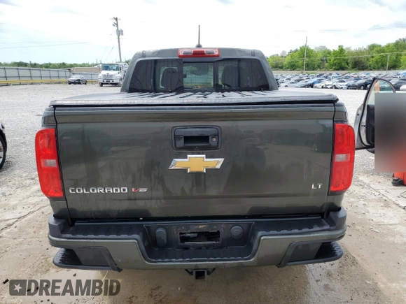 2018 Chevrolet Colorado 4WD LT with VIN 1GCGTCENXJ1117124, listed as a Copart auction lot 55953395 with 88,759 mi miles and Salvage title. Bid and sale history available at DreamBid. Image 6.