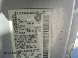 2005 Nissan Titan SE z VIN 1N6AA06AX5N500773, wystawiony jako Copart lot #81695634 z przebiegiem 127 210 mil mil oraz Szkoda całkowita • Salvage title. Historia ofert i sprzedaży dostępna na DreamBid. Obrazek 12.