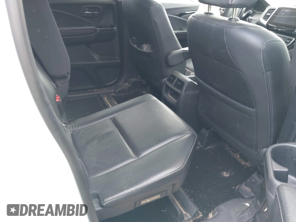 2018 Honda Ridgeline RTL-E with VIN 5FPYK3F77JB004379, listed as a IAAI auction lot 41802025 with 132,085 mi miles and . Bid and sale history available at DreamBid. Image 8.