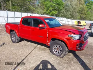 2018 Toyota Tacoma SR5 with VIN 5TFAZ5CN2JX069067, listed as a IAAI auction lot 41975459 with 92,434 mi miles and . Bid and sale history available at DreamBid. Image 1.