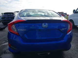 2019 Honda Civic Sport z VIN 19XFC2F8XKE014945, wystawiony jako IAAI lot #41662552 z przebiegiem 47 914 mil mil oraz . Historia ofert i sprzedaży dostępna na DreamBid. Obrazek 15.
