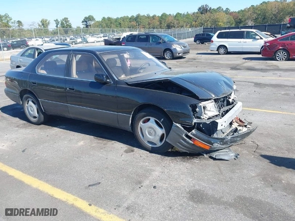 1997 Lexus LS 400 Luxury Sdn with VIN JT8BH28F3V0096105, listed as a IAAI auction lot 40668095 with 144,362 mi miles. Bid and sale history available at carsss.com. Image 1.
