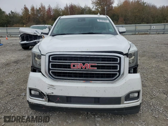 2020 GMC Yukon SLT with VIN 1GKS1BKC3LR168874, listed as a Copart auction lot 82103464 with 79,220 mi miles and Salvage Title. Bid and sale history available at DreamBid. Image 5.