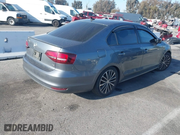 2016 Volkswagen Jetta Sport z VIN 3VWD17AJ0GM386504, wystawiony jako IAAI lot #42000125 z przebiegiem 90 405 mil mil oraz . Historia ofert i sprzedaży dostępna na DreamBid. Obrazek 4.