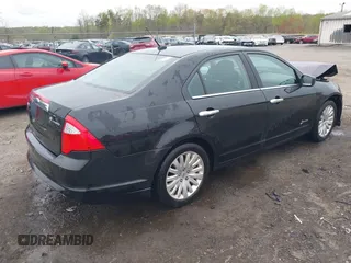 2010 Ford Fusion Hybrid with VIN 3FADP0L38AR263525, listed as a IAAI auction lot 41952084 with 112,681 mi miles. Bid and sale history available at carsss.com. Image 4.
