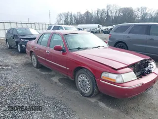 2003 Mercury Grand Marquis GS Convenience with VIN 2MEFM74W33X705854, listed as a IAAI auction lot 41619958 with 149,356 mi miles and . Bid and sale history available at DreamBid. Image 1.