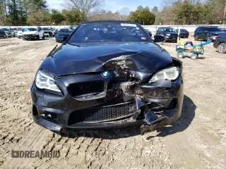 2018 BMW M6 z VIN WBS6G9C50JD950282, wystawiony jako Copart lot #46023174 z przebiegiem 14 184 mil mil oraz . Historia ofert i sprzedaży dostępna na DreamBid. Obrazek 5.