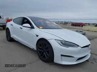 2021 Tesla Model S Plaid with VIN 5YJSA1E69MF452593, listed as a IAAI auction lot 41639406 with 1 mi miles. Bid and sale history available at carsss.com. Image 1.