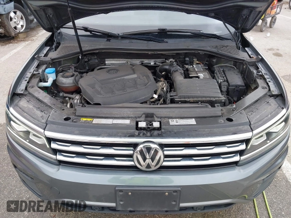 2019 Volkswagen Tiguan SEL Premium with VIN 3VV4B7AX9KM095580, listed as a IAAI auction lot 41915639 with 67,440 mi miles and . Bid and sale history available at DreamBid. Image 10.