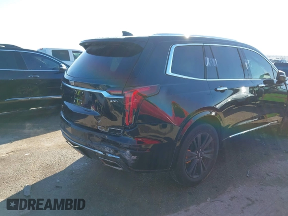 2022 Cadillac XT6 Premium Luxury with VIN 1GYKPCRS1NZ121711, listed as a IAAI auction lot 41149624 with 62,887 mi miles and . Bid and sale history available at DreamBid. Image 4.