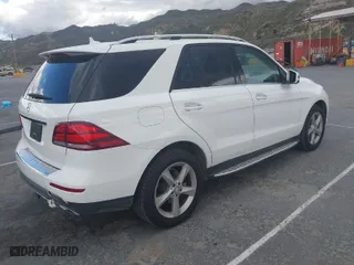 2016 Mercedes-Benz GLE with VIN 4JGDA5JB0GA772199, listed as a IAAI auction lot 41926309 with 38,550 mi miles. Bid and sale history available at carsss.com. Image 4.