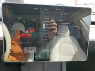 2021 Tesla Model 3 Standard Range Plus with VIN 5YJ3E1EA9MF870214, listed as a Copart auction lot 47702535 with 46,486 mi miles and Salvage Title. Bid and sale history available at DreamBid. Image 9.