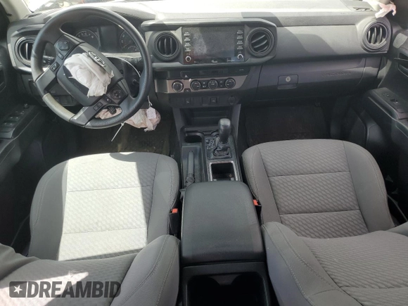 2021 Toyota Tacoma SR z VIN 3TMCZ5ANXMM375679, wystawiony jako Copart lot #58207995 z przebiegiem Nie podano mil oraz Szkoda całkowita • Salvage title. Historia ofert i sprzedaży dostępna na DreamBid. Obrazek 8.
