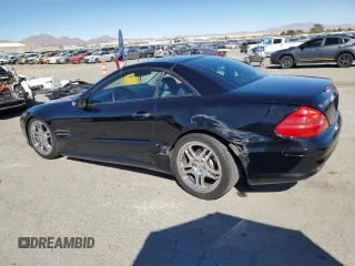 2005 Mercedes-Benz SL 500 with VIN WDBSK75F95F100318, listed as a Copart auction lot 50427245 with 80,320 mi miles and Salvage Title. Bid and sale history available at DreamBid. Image 2.