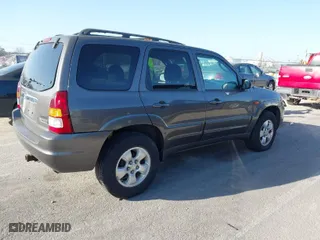 2004 Mazda Tribute LX with VIN 4F2YZ04114KM13048, listed as a IAAI auction lot 41800446 with 152,303 mi miles. Bid and sale history available at carsss.com. Image 4.