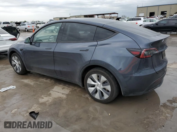 2023 Tesla Model Y Long Range with VIN 7SAYGDEE3PA151887, listed as a Copart auction lot 51459495 with 15,562 mi miles and Salvage Title. Bid and sale history available at DreamBid. Image 2.