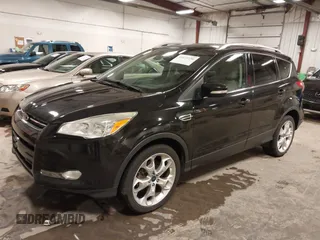 2014 Ford Escape Titanium with VIN 1FMCU9J95EUD85537, listed as a IAAI auction lot 41472236 with 154,796 mi miles. Bid and sale history available at carsss.com. Image 2.