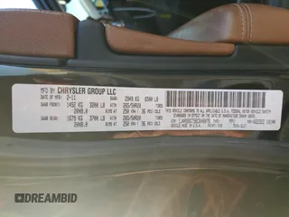 2011 Jeep Grand Cherokee Overland with VIN 1J4RS6GT5BC648076, listed as a Copart auction lot 48878135 with 223,263 mi miles and Salvage Title. Bid and sale history available at DreamBid. Image 12.