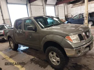 2005 Nissan Frontier 4WD LE with VIN 1N6AD07W95C411421, listed as a IAAI auction lot 41847242 with 209,816 mi miles. Bid and sale history available at carsss.com. Image 13.
